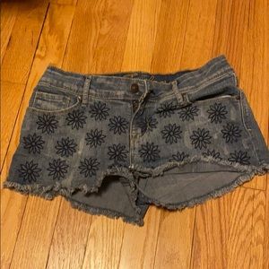 Denim shorts with flower decals